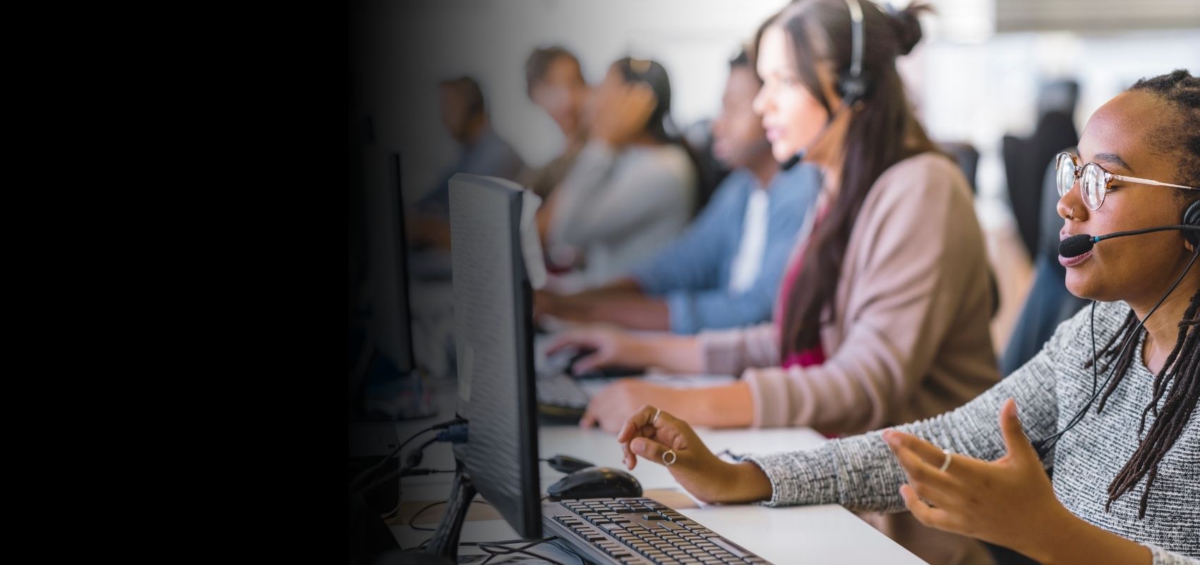 HelpAlert UK support team answering emergency alarm calls in the control room